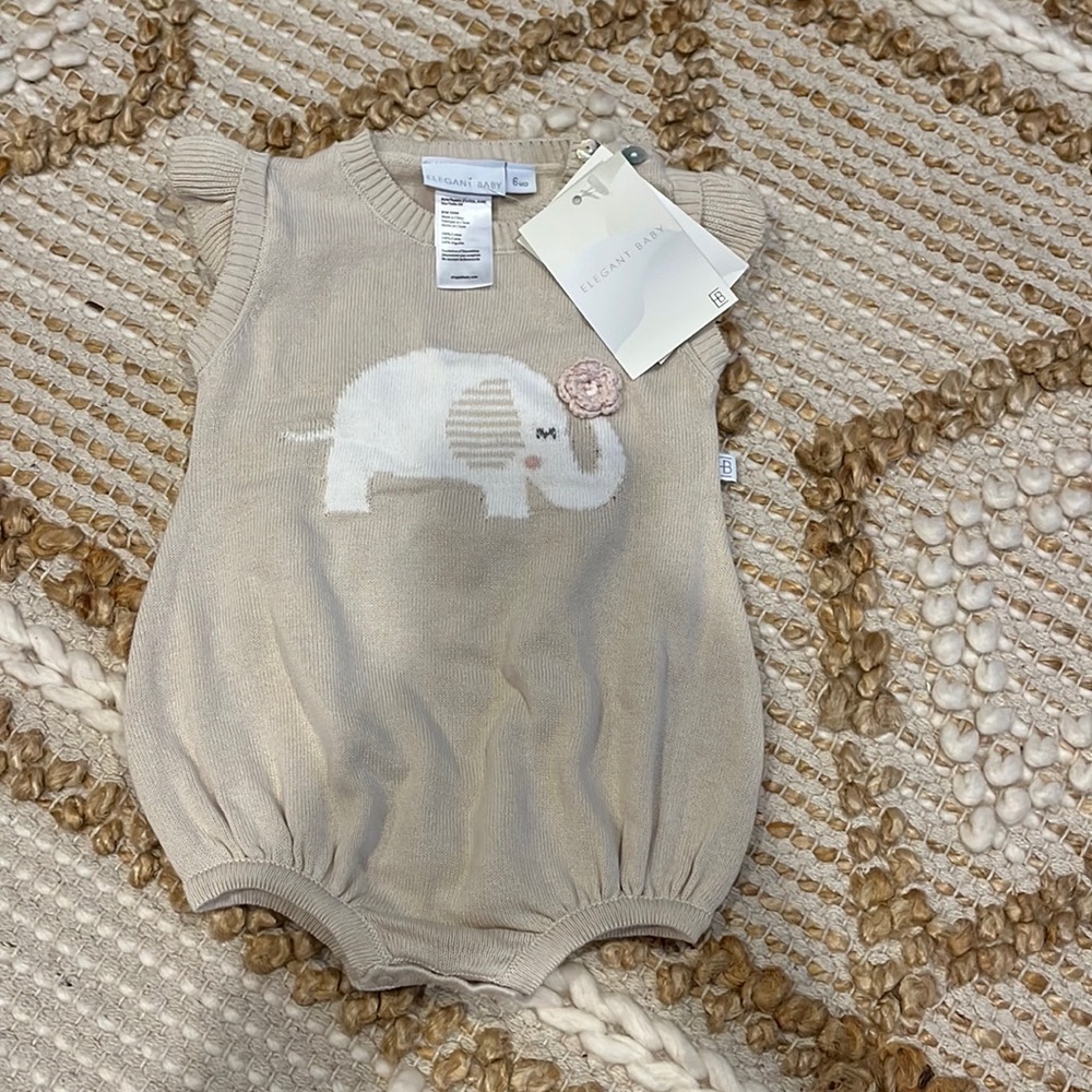 Never worn adorable knot onesie with elephant